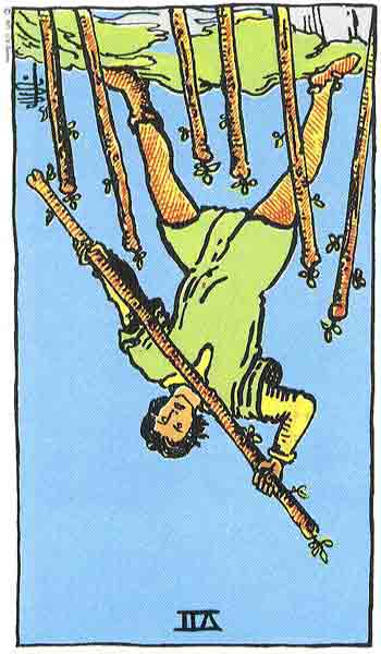 Carta de Tarot de Rider - Waite siete de Bastos (invertido) en marifranstarot.com